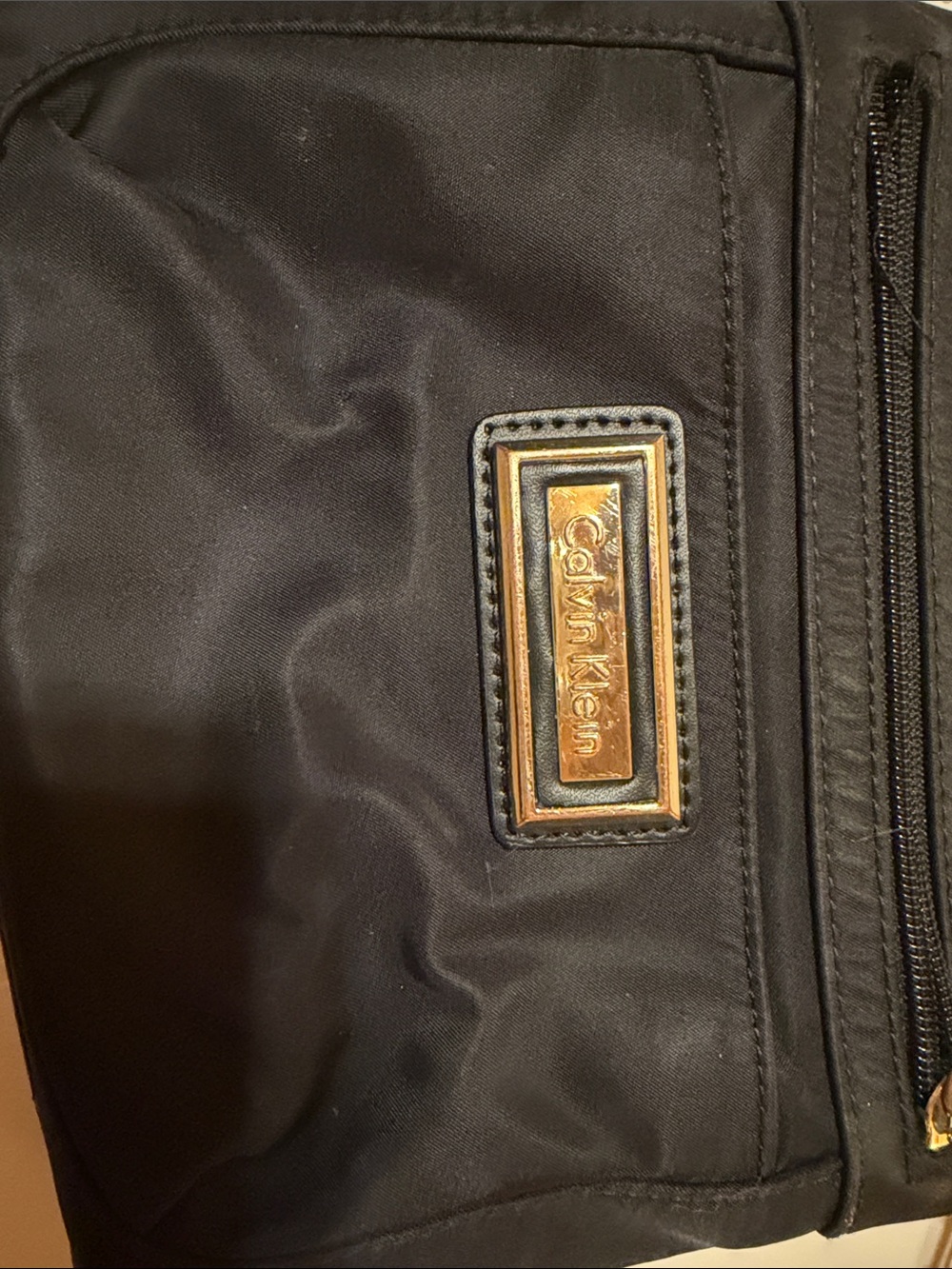 Calvin Klein Black Crossbody Bag with Gold Logo Plate
